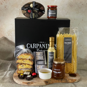 carpaninis black gift box with chocolates sauce cantucci chocolate bar olive oil honey and pasta