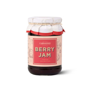 Jar of berry jam with a decorative label on a white background