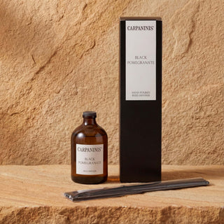 A black pomegranate reed diffuser set