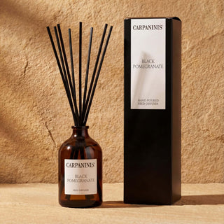 A black pomegranate reed diffuser