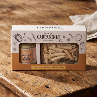 A Carpaninis cacio e pepe gift set on a wooden table