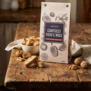 A packet of Carpaninis cantucci with fig and walnut on a wooden table