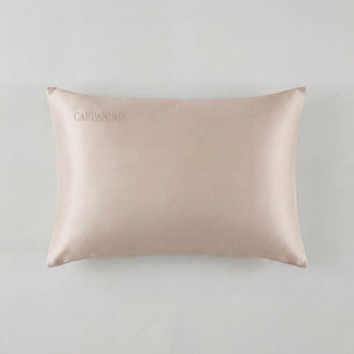 Silk pillowcase with 'CARPANINIS' branding on a light gray background