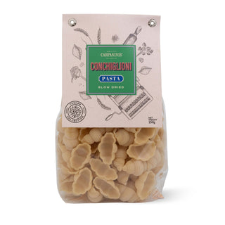 Bag of Carpanini's Conchiglioni pasta with a decorative label on a white background