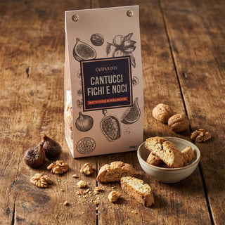 A packet of fig and walnut cantucci on a wooden table