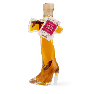Bottle shaped like Italy, high-heeled shoe with a label on a white background