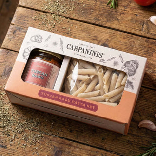 A gift pack of penne and Tuscan ragu sauce on a table