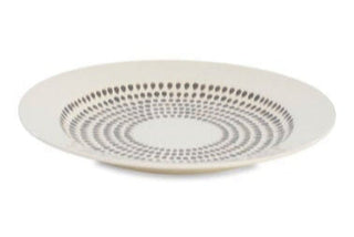 White plate with gray circular pattern on a white background