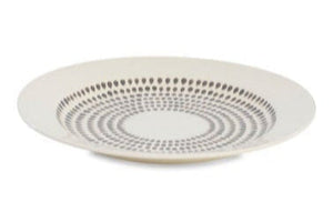 White plate with gray circular pattern on a white background
