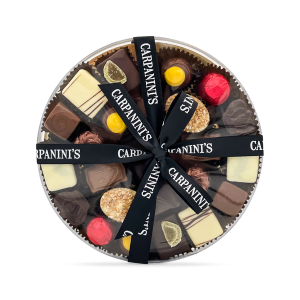 carpaninis large round clear box of assorted belgian chocolates with black ribbon