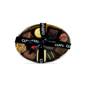 carpaninis medium round clear box of assorted belgian chocolates with black ribbon