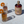 Load image into Gallery viewer, carpaninis organic rum bottle with two high ball rum glasses in the sun
